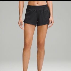 Lululemon low rise hotty hot 4” (“tall”) black shorts